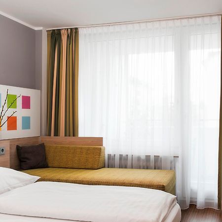 Business & Budget Hotel Tessin Munique Exterior foto