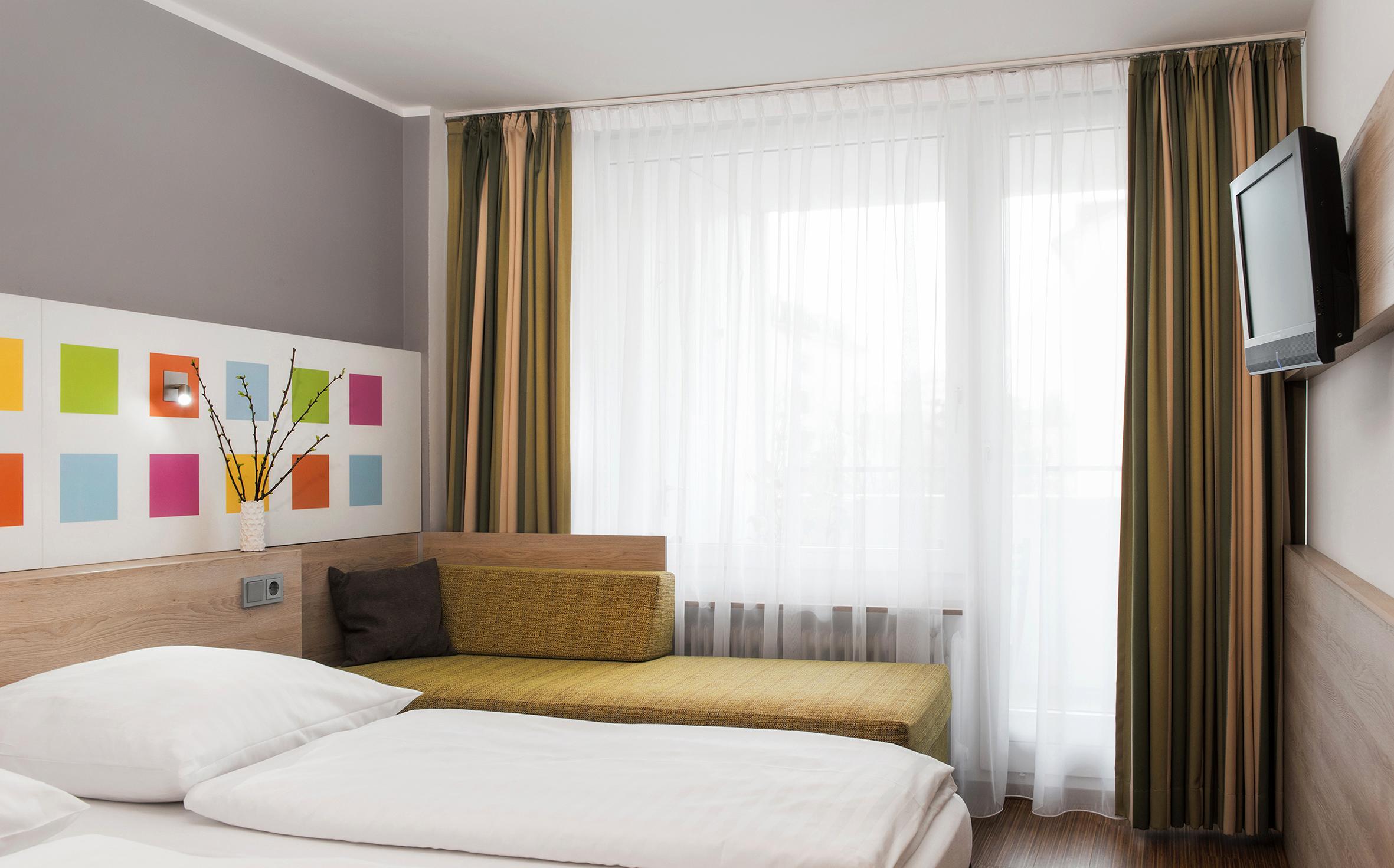 Business & Budget Hotel Tessin Munique Exterior foto