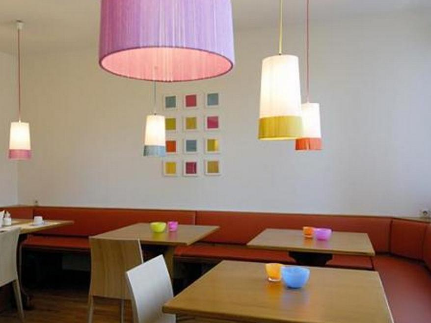 Business & Budget Hotel Tessin Munique Restaurante foto