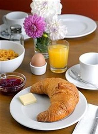 Business & Budget Hotel Tessin Munique Restaurante foto